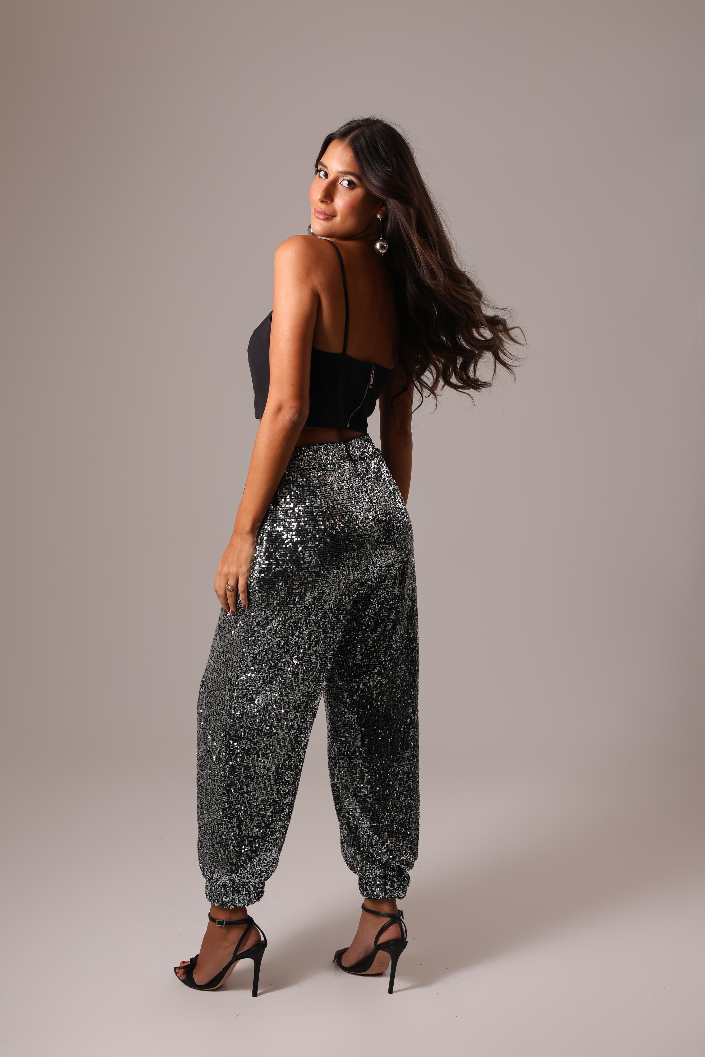 CALÇA JOGGER PAETÊ PRETA E PRATA